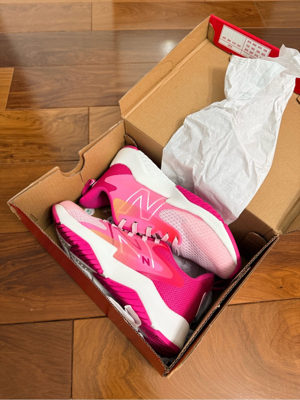 New Balance Hot Pink and Light Pink Kid’s Athletic Sneakers
